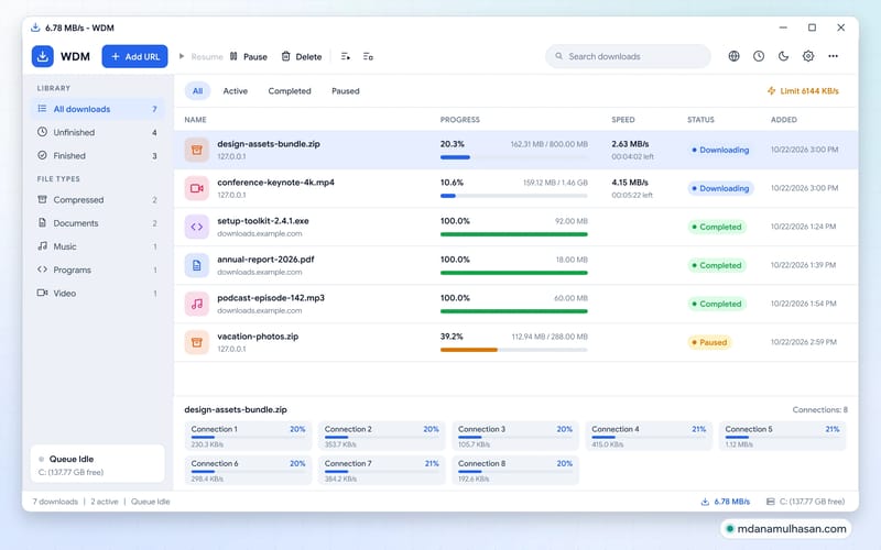 WDM main window listing active downloads with progress and speed